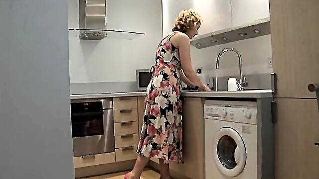 Mature blonde in stockings dildos her sweet cunt