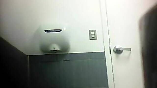 Spying her pee and put a tampon in