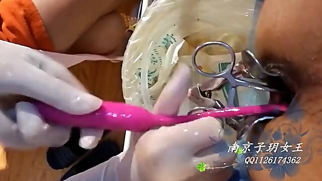 Beautiful Female Surgeon With Surgical Gloves Fisting