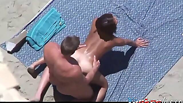 Amateur couples filmed fucking on the beach