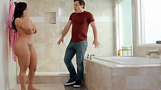 Hot thick mom with huge cleavage fucks a guy half her age.