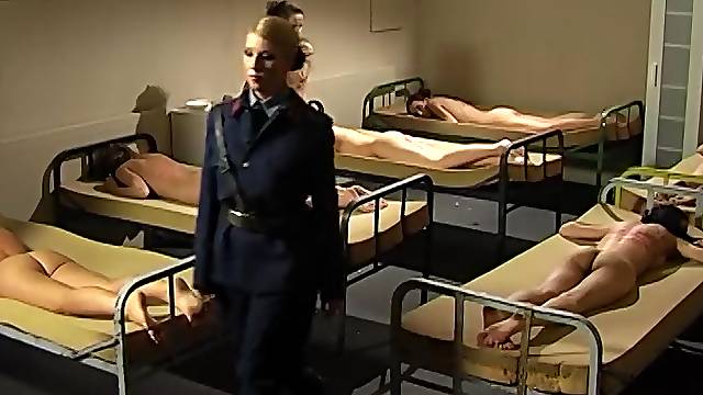 Brunette girl gets tied up before a mistress starts punishing her