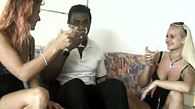 Two steaming hot nymphs are sharing a huge black cock