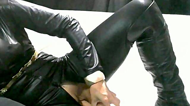 Fetish wifey in Leather long pulverizes Handjob