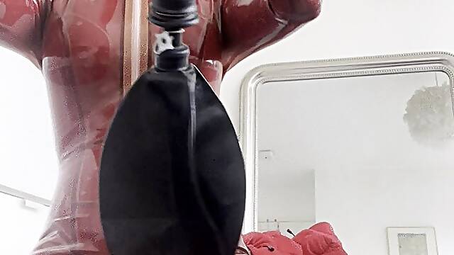 Layers of latex rubber catsuit and gasmask tease and cum