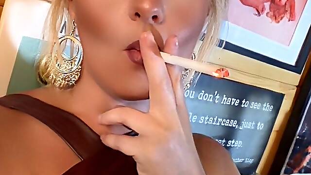 Selfie smoke break… close-up as I hold the camera and slowly work this cigarette, lips parted, eyes locked on you the whole time.